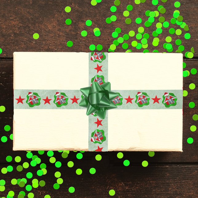 Weihnachten lächeln Skeleton Helle Spritzer Formen Satinband (Happy skeletons red stars splatter shapes on light green Christmas wrapping ribbon.)