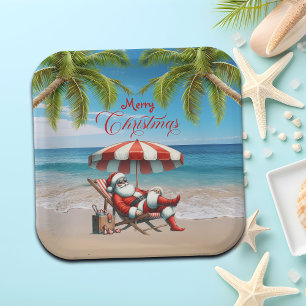Weihnachten mit Santa unter einem Strandsonnenschi Pappteller