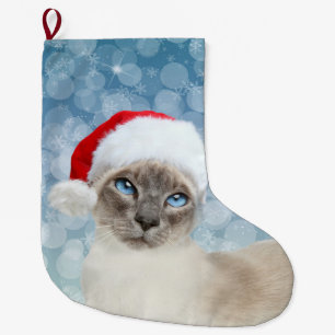 Weihnachten siamesische Katze des blauen Punktes Großer Weihnachtsstrumpf