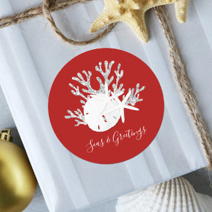 Weihnachten und Grüße an der Küste Runder Aufkleber