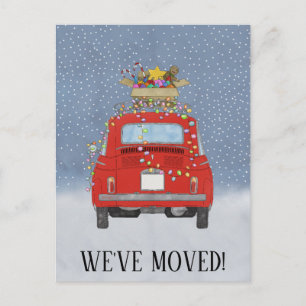 Weihnachten Wir sind umgezogen rotes Auto mit Lich Postkarte