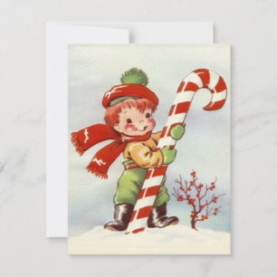 Weihnachtlicher Junge mit großer Zuckerstange Feiertagskarte