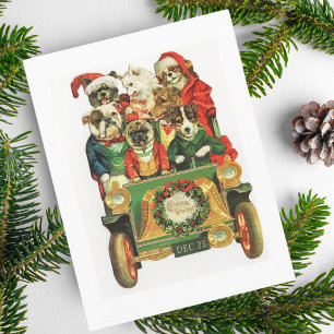 Weihnachtlicher Lastwagen voller Hunde im Vintage- Feiertagspostkarte