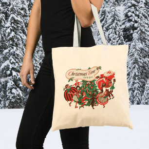 Weihnachtlicher Santa Claus und tanzende Kinder im Tragetasche