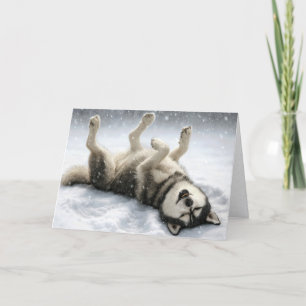 Weihnachtlicher Sibirischer Husky macht einen Schn Feiertagskarte