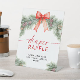Weihnachts-Babyshower-Wickelraffel-Schild mit rote Sockelschild