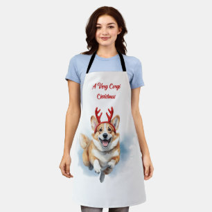 Weihnachts-Corgi mit Rentier-Antlers springen Schürze