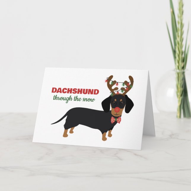 Weihnachts-Dackel durch den Schneekneehund Karte (Vorderseite)