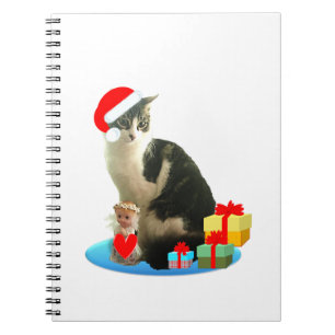 Weihnachts-Dreckspatzkatze und niedlicher kleiner Notizblock