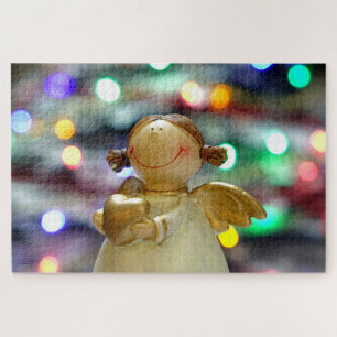 Weihnachts-Engel Holding a Liebe Herz Puzzle