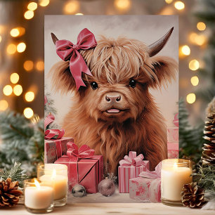 Weihnachts-Hochlandkuh mit rosa Schleife Feiertagskarte