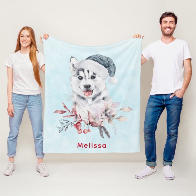 Weihnachts-Husky-Hund in einer Weihnachtsmannmütze Fleecedecke (Beispiel)