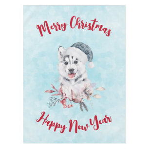 Weihnachts-Husky-Hund in einer Weihnachtsmannmütze Tischdecke