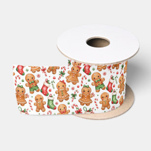Weihnachts-Lebkuchenjunge und -Mädchen mit Strümpf Satinband