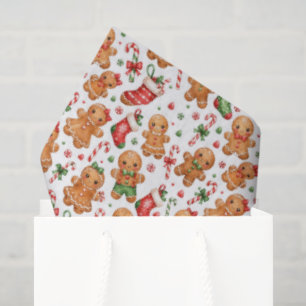 Weihnachts-Lebkuchenjunge und -Mädchen mit Strümpf Seidenpapier