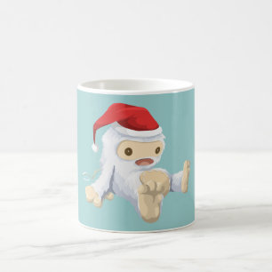 Weihnachts-Monster-Puppe mit roter Weihnachtsmannm Kaffeetasse