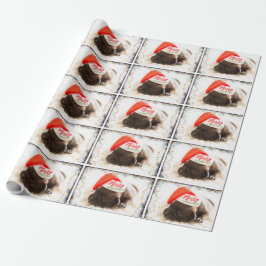 Weihnachts-Mops in Weihnachtsmannmütze mit Weihnac Geschenkpapier