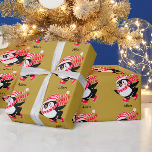 Weihnachts-Penguin in einem Hut und Scarf auf Skat Geschenkpapier