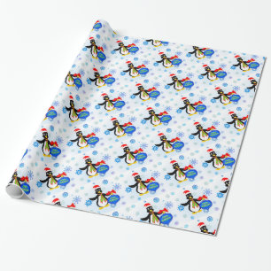 Weihnachts-Penguin und Schneeflocken Geschenkpapier