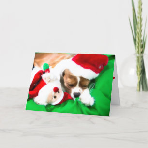 Weihnachts-Schlafender Welpe mit Santa-Hundespielz Feiertagskarte