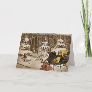 Weihnachts-Schlitten mit Geschenken im Winterwald Feiertagskarte