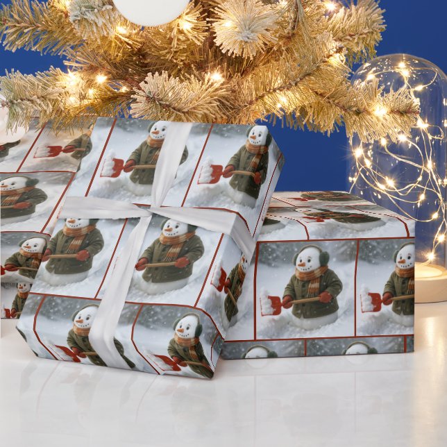 Weihnachts-Schneemann schippt Schnee Geschenkpapier (Feiertage)