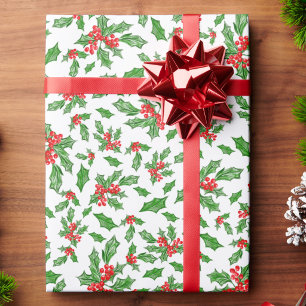 Weihnachts-Stechpalmenblätter und -Beeren rot und Geschenkpapier