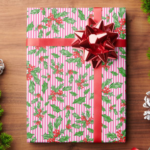 Weihnachts-Stechpalmenblätter und -Beeren rot und Geschenkpapier