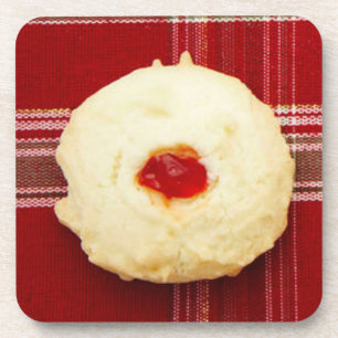 Weihnachts-Thumbprint-Cookie auf Karierten Getränkeuntersetzer