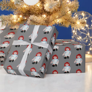 Weihnachts-Tücherpuppe auf Grau Geschenkpapier