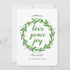 Weihnachts- und Neujahrskranz. Liebe, Frieden, Fre Feiertagskarte