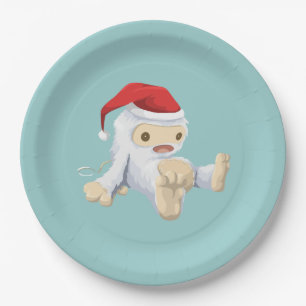 Weihnachts-Yeti-Puppe Eine Weihnachtsmannmütze tra Pappteller