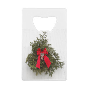 Weihnachtsband und Baum in einer Scheune Geldbeutel Flaschenöffner