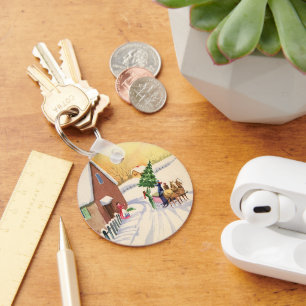 Weihnachtsbaum auf einer schneebedeckten Winterstr Schlüsselanhänger