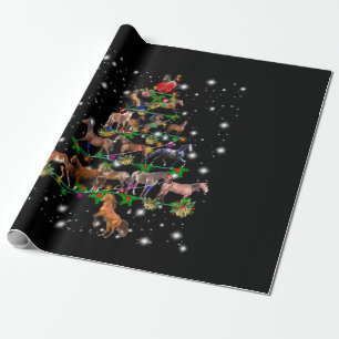 Weihnachtsbaum des Pferdes, bedeckt durch Blitzlic Geschenkpapier