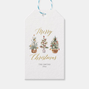 Weihnachtsbäume glückliche Feiertage Geschenktaste Geschenkanhänger