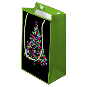 Weihnachtsbaumjuwelen auf Grün Kleine Geschenktüte
