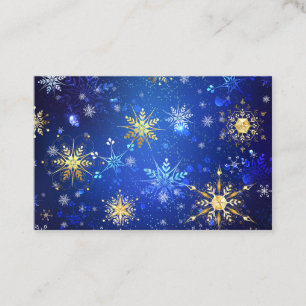 Weihnachtsblaue Hintergrund mit goldenen Schneeflo Empfehlungskarte
