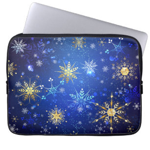 Weihnachtsblauer Hintergrund mit goldenen Schneefl Laptopschutzhülle