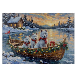Weihnachtsboot mit weißen Samojeden - Winterurlaub Schneidebrett