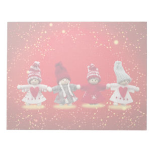 Weihnachtsdekorationen auf rotem Hintergrund Notizblock