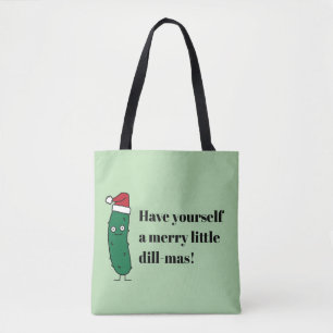 Weihnachtsdillgurke mit einem Weihnachtsmannhut