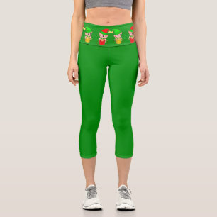 Weihnachtselfen auf Grün Capri Leggings