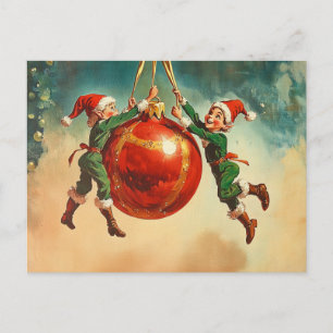 Weihnachtselfen mit einem riesigen Weihnachtsschmu Postkarte