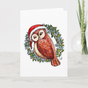 Weihnachtseule in einer Weihnachtsmannmütze Feiertagskarte