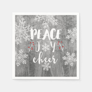 Weihnachtsfeier mit Frieden Freude und silbernen S Serviette