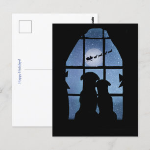 Weihnachtsfeiertag Niedliche Hunde im Fenster Postkarte