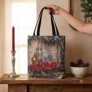Weihnachtsfenster mit Poinsettie im Schnee
