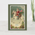 Weihnachtsfest Feiertagskarte<br><div class="desc">Vintage Bild des Weihnachtsmannes,  der die amerikanische Flagge auf einem Pferd hält.
Holly und Berries</div>