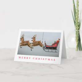 Weihnachtsfiguren und Schlittenfiguren Weihnachtsk Feiertagskarte